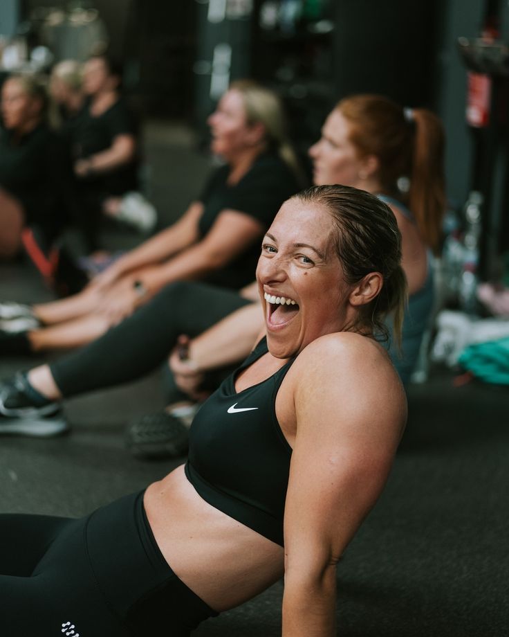 women in srpnt active wear apparel looking tired and happy after a difficult workout which clearly shows SRPNT's strong community 
